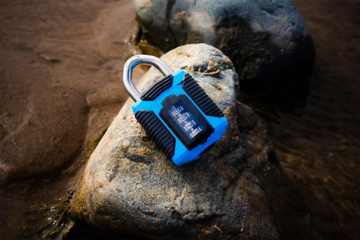 Padlock on a beach rock